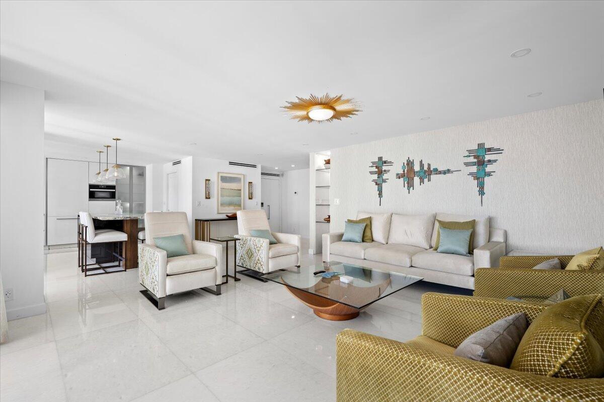 2000 South Ocean Boulevard, Unit 11D Boca Raton, FL 33432 - Photo 30 of 31 a living room with furniture and a couch