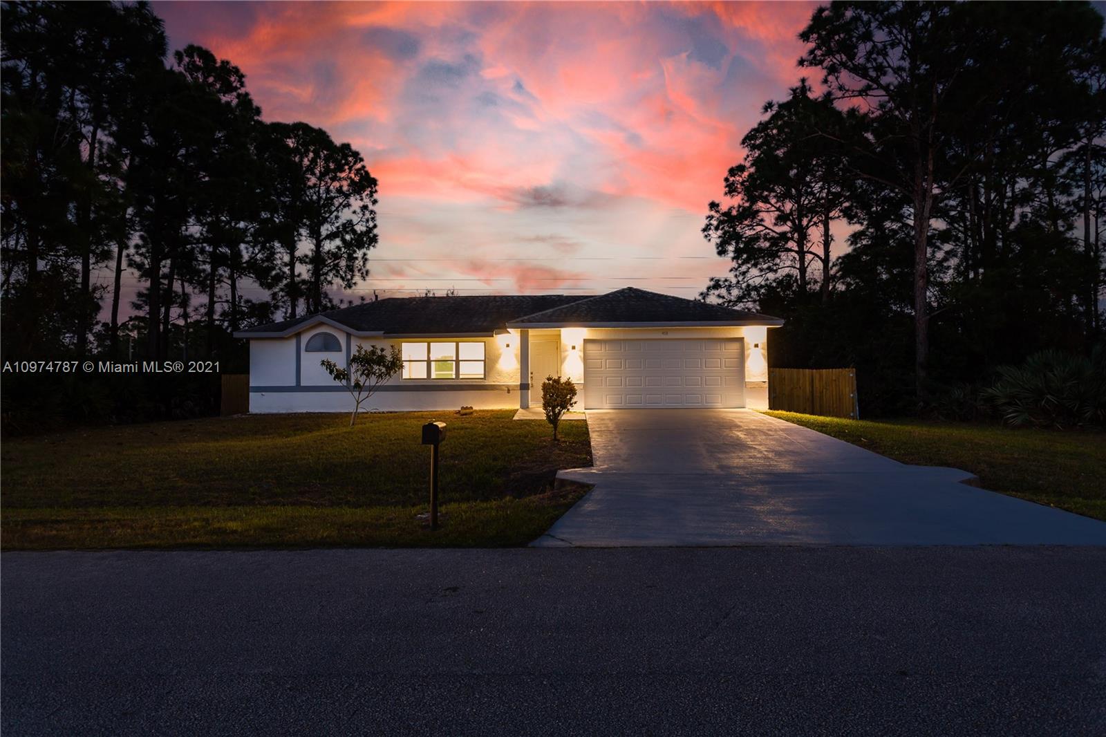 453 Town Road Southwest Palm Bay, FL 32908 - Photo 1 of 19 a view of a house with a yard