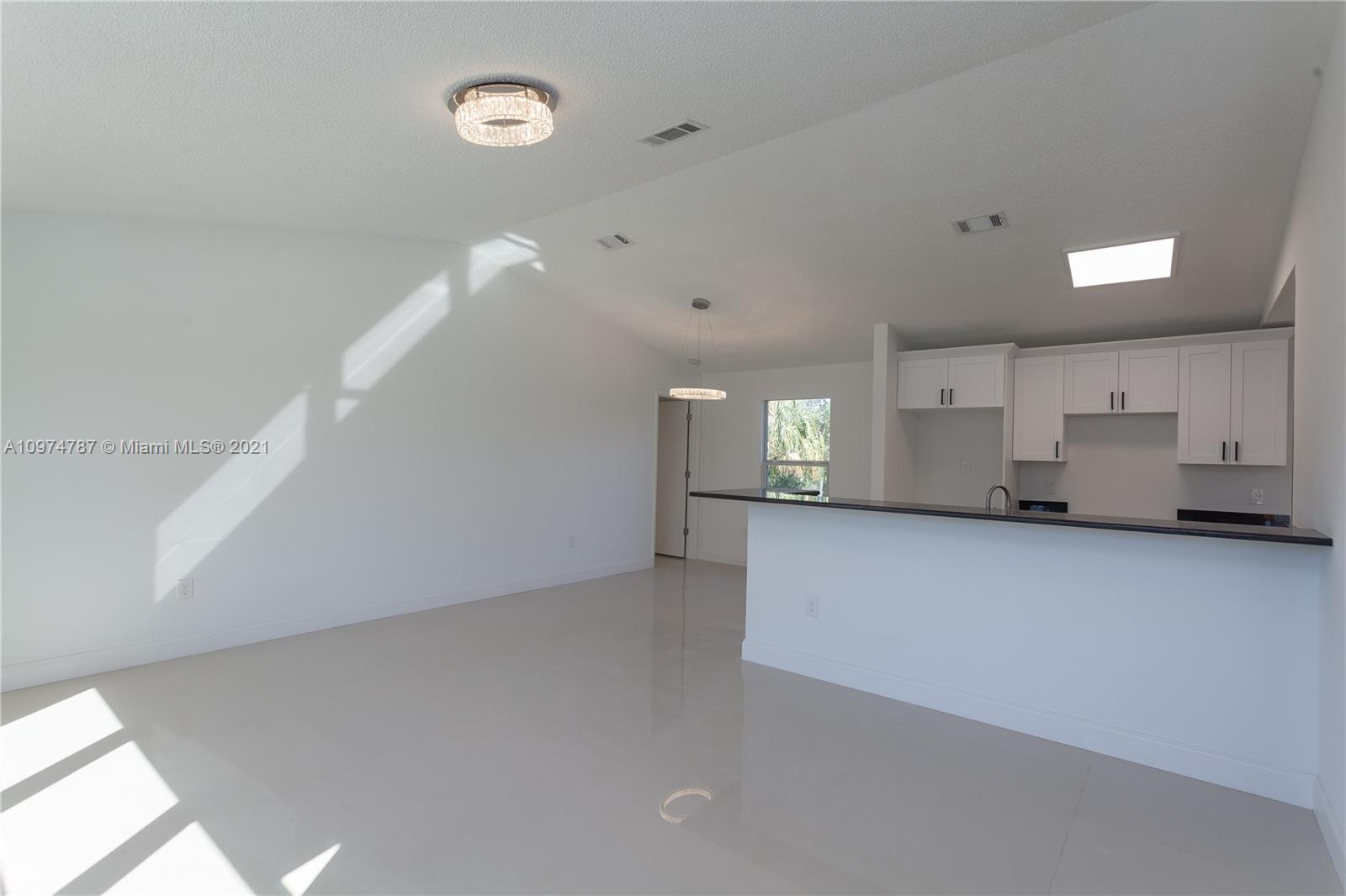 453 Town Road Southwest Palm Bay, FL 32908 - Photo 8 of 19 a view of a kitchen with a sink
