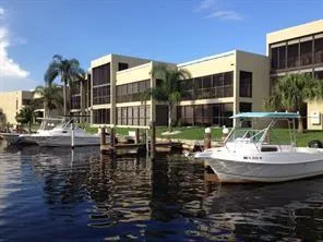 an aerial view of a city with lake view