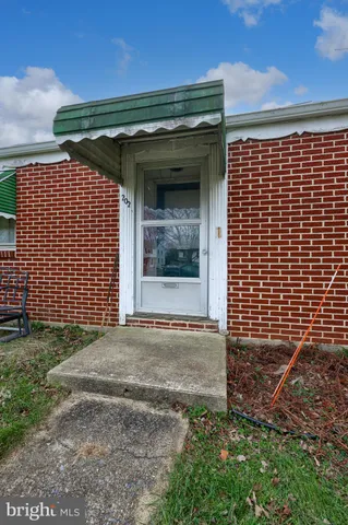 a front view of a house with a garage
