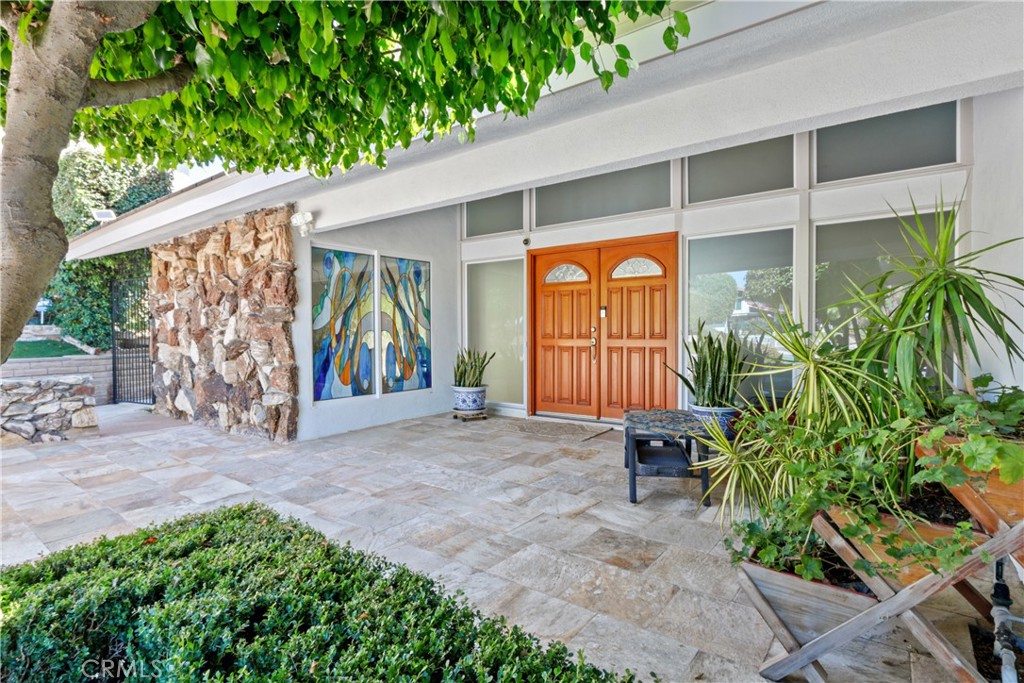 6046 Altmark Avenue Whittier, CA 90601 - Photo 2 of 27 a view of a entrance gate of the house