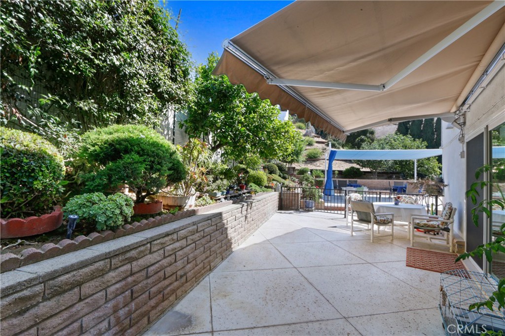 6046 Altmark Avenue Whittier, CA 90601 - Photo 27 of 27 a view of a chairs and table in a patio