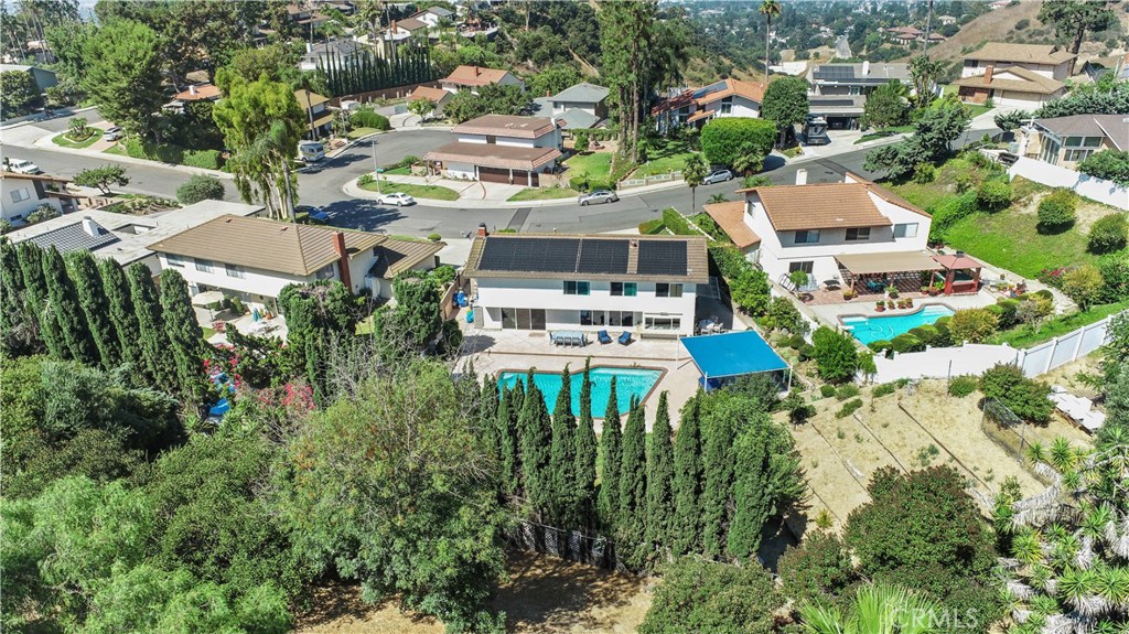 6046 Altmark Avenue Whittier, CA 90601 - Photo 9 of 27 an aerial view of residential houses with outdoor space