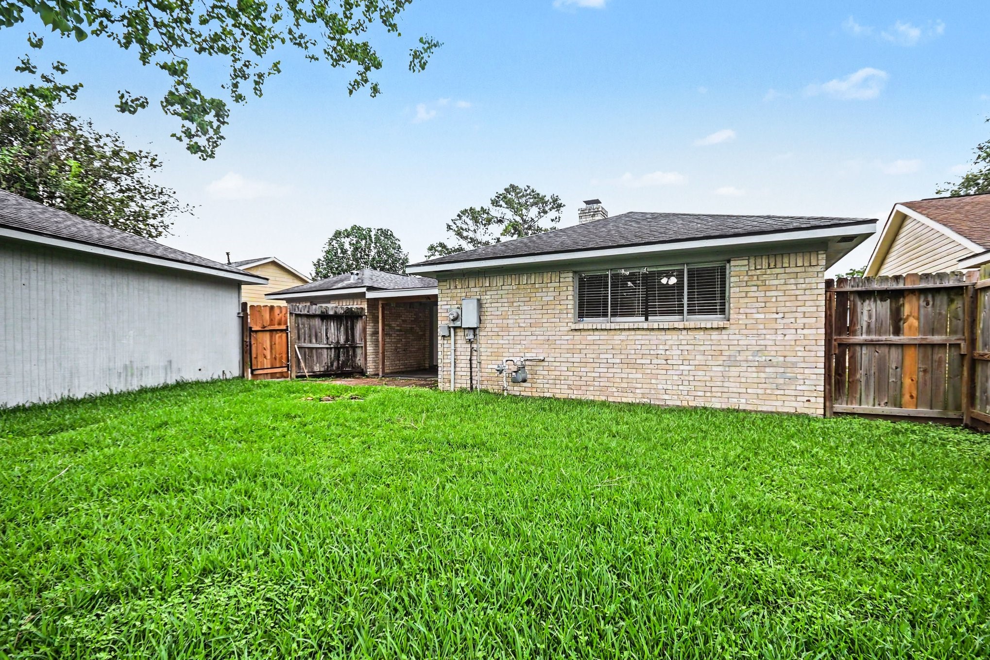 4306 Oneida Street Pasadena, TX 77504 - Photo 21 of 23 a front view of a house with garden