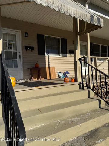 a view of swimming pool with a porch