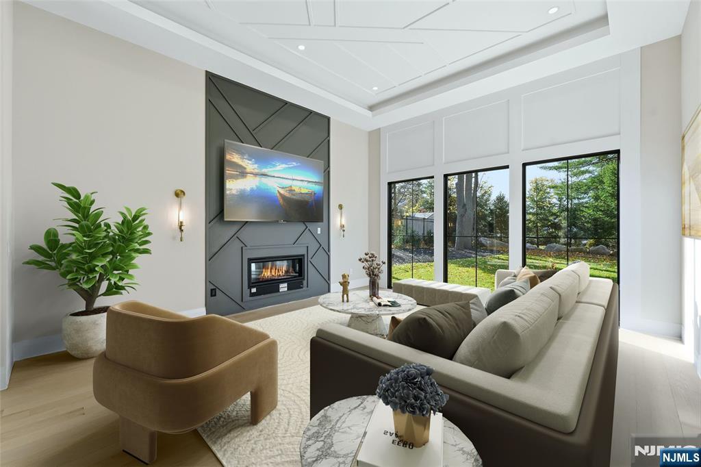 121 Engle Street Cresskill, NJ 07626 - Photo 6 of 50 a living room with furniture potted plant and a fireplace