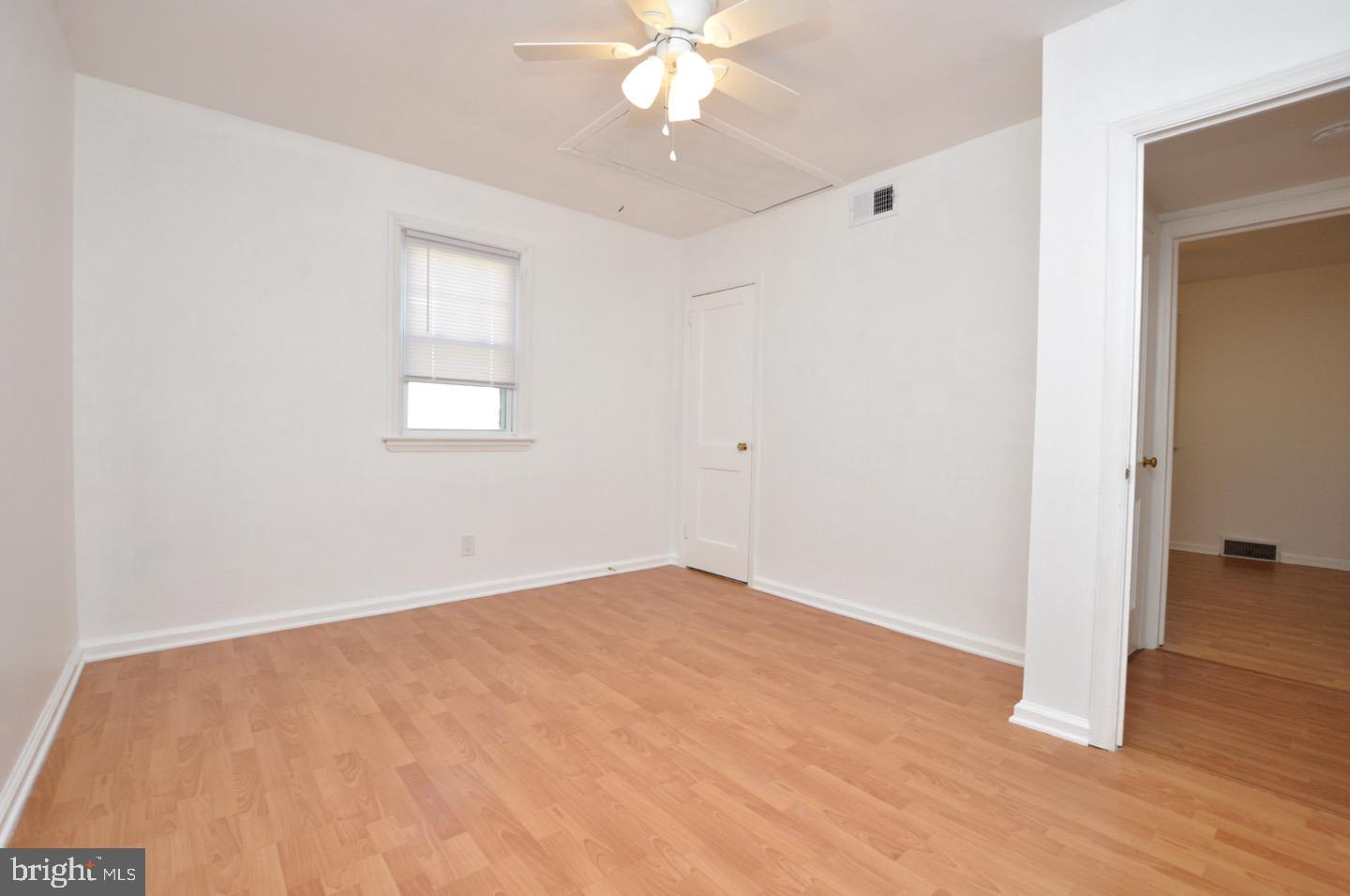 432 North Coles Avenue Maple Shade, NJ 08052 - Photo 17 of 26 wooden floor in an empty room with a window