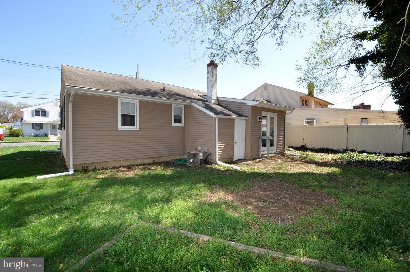 432 North Coles Avenue Maple Shade, NJ 08052 - Photo 25 of 26 a front view of a house with a garden and yard