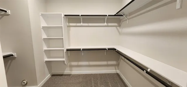 a bathroom with a sink double vanity and a mirror
