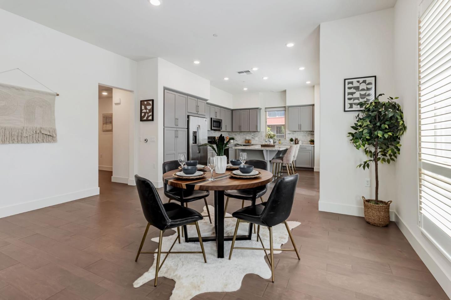 390 Riesling Avenue, Unit 30 Milpitas, CA 95035 - Photo 17 of 37 a view of a dining room with furniture and window
