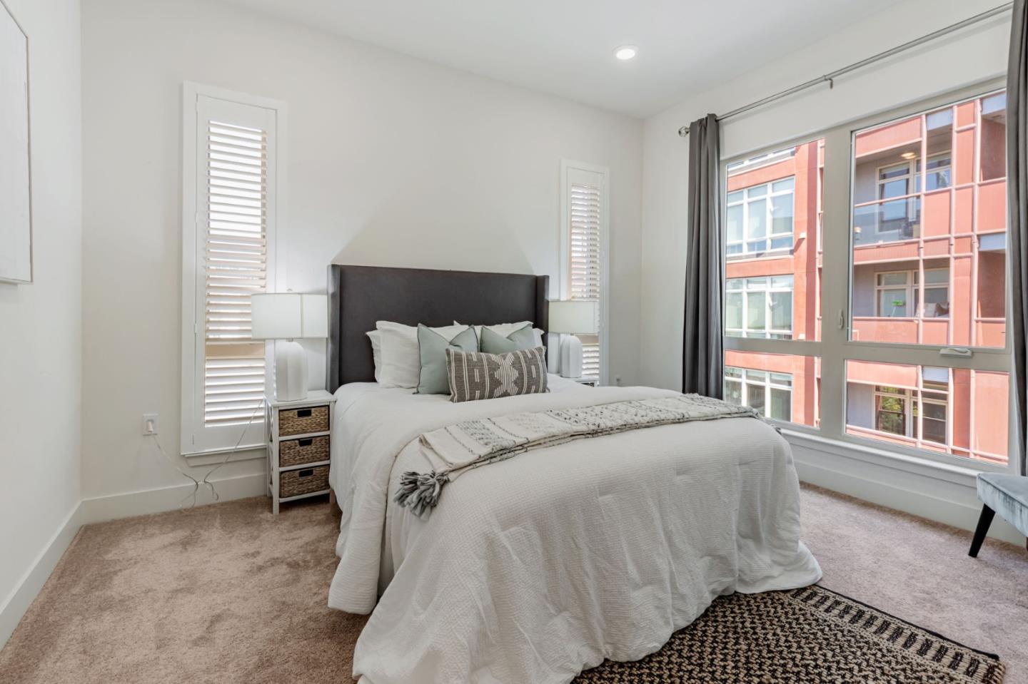 390 Riesling Avenue, Unit 30 Milpitas, CA 95035 - Photo 21 of 37 a bedroom with a bed and a window