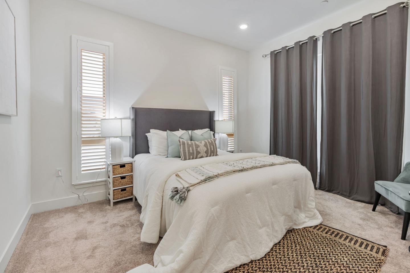 390 Riesling Avenue, Unit 30 Milpitas, CA 95035 - Photo 24 of 37 a bedroom with a bed and a window