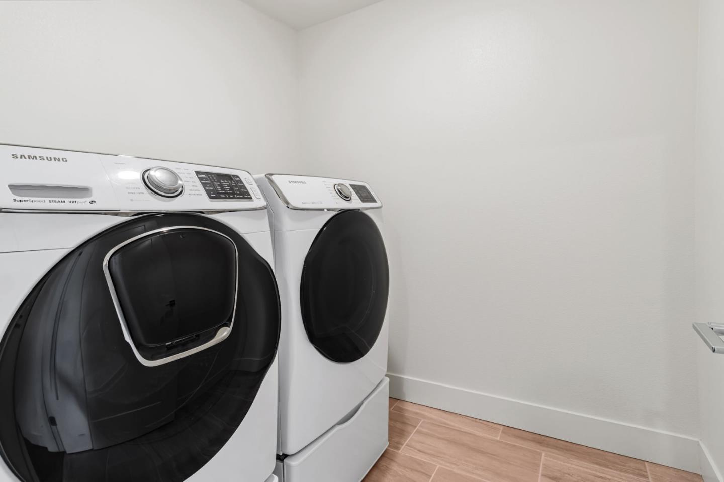 390 Riesling Avenue, Unit 30 Milpitas, CA 95035 - Photo 30 of 37 a utility room with dryer and washer