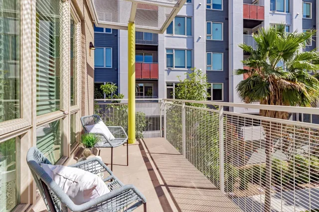 a view of balcony with furniture