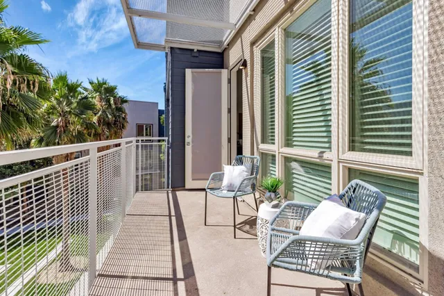 a view of a building with a yard