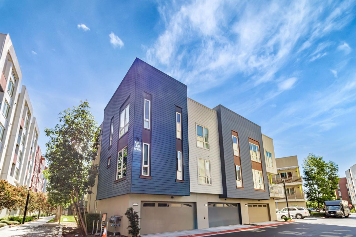 390 Riesling Avenue, Unit 30 Milpitas, CA 95035 - Photo 36 of 37 a red brick building with large windows