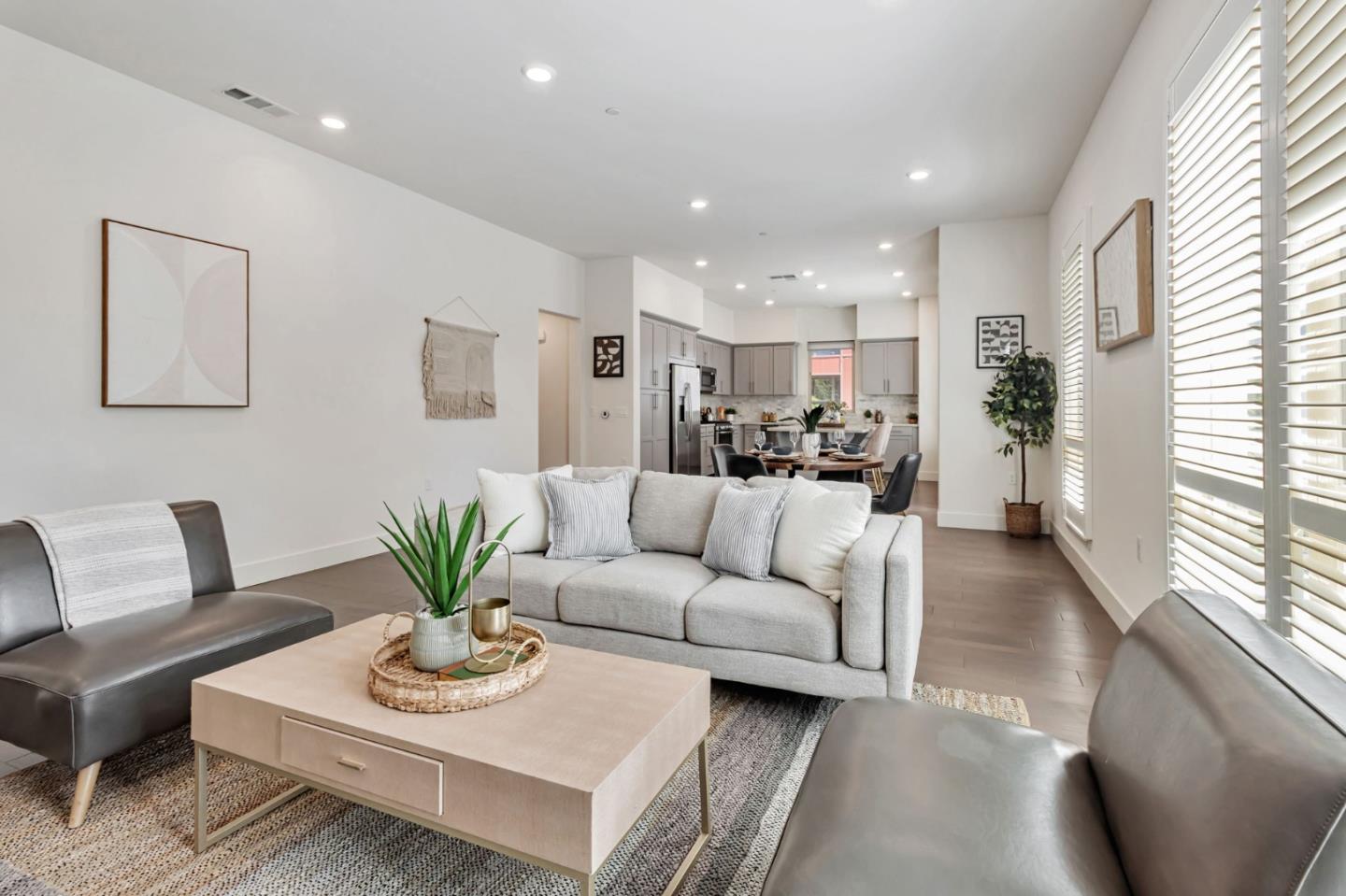 390 Riesling Avenue, Unit 30 Milpitas, CA 95035 - Photo 8 of 37 a living room with furniture kitchen and a large window