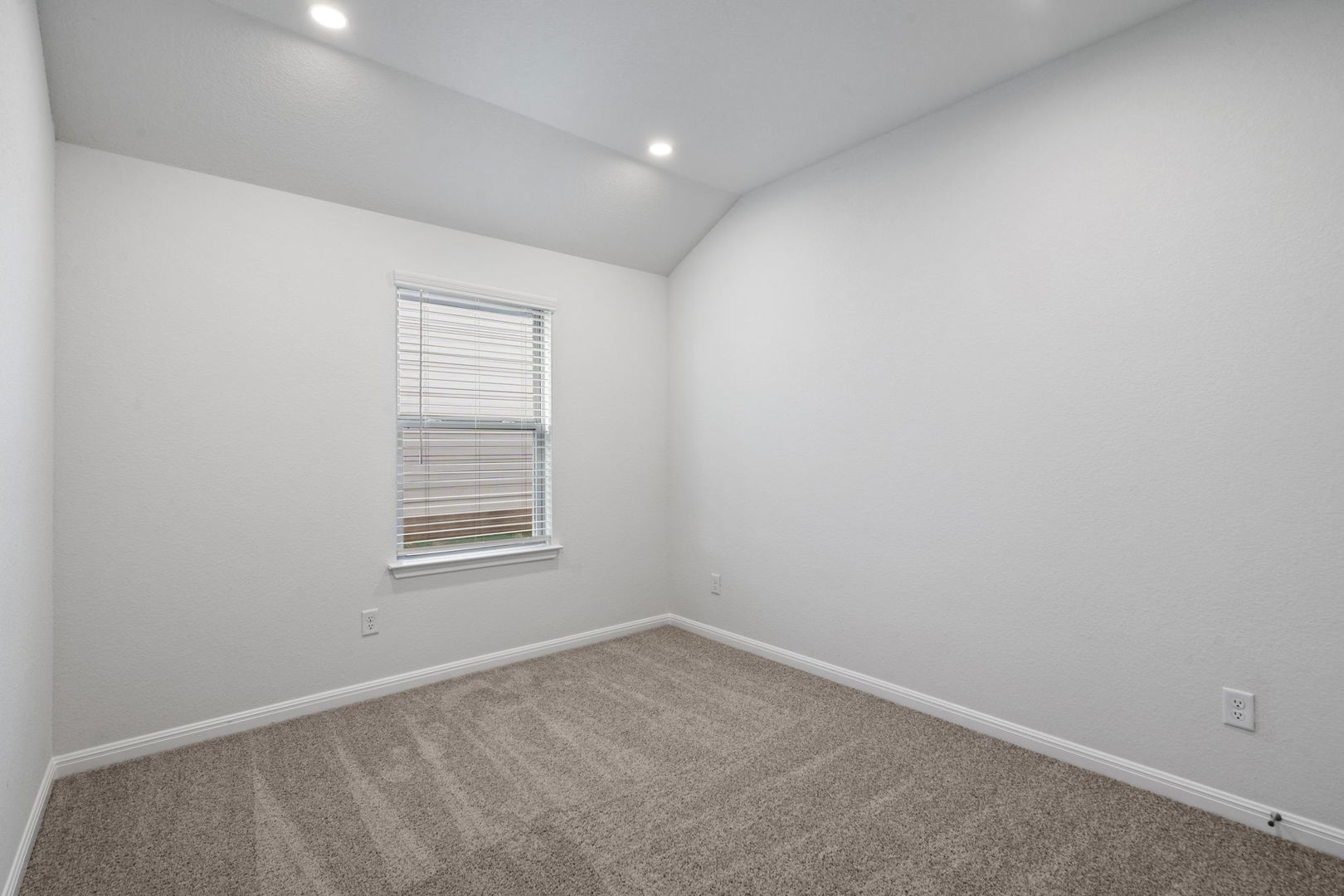 141 Hatari Trail Jarrell, TX 76537 - Photo 18 of 36 an empty room with a window