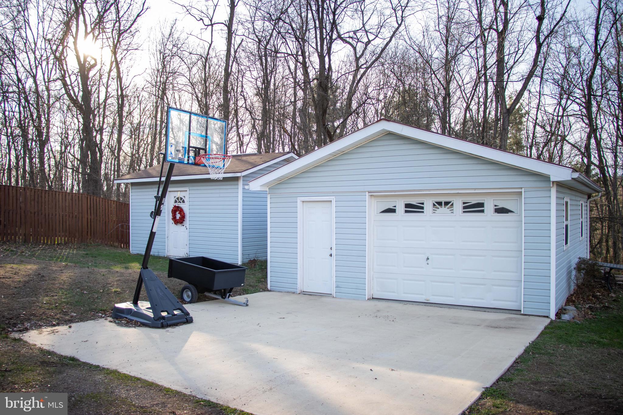 387 West Ridge Loop Road Romney, WV 26757 - Photo 30 of 58 Shed, Garage & concrete pad