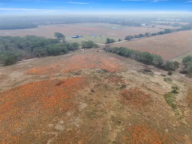 a view of a field with beach