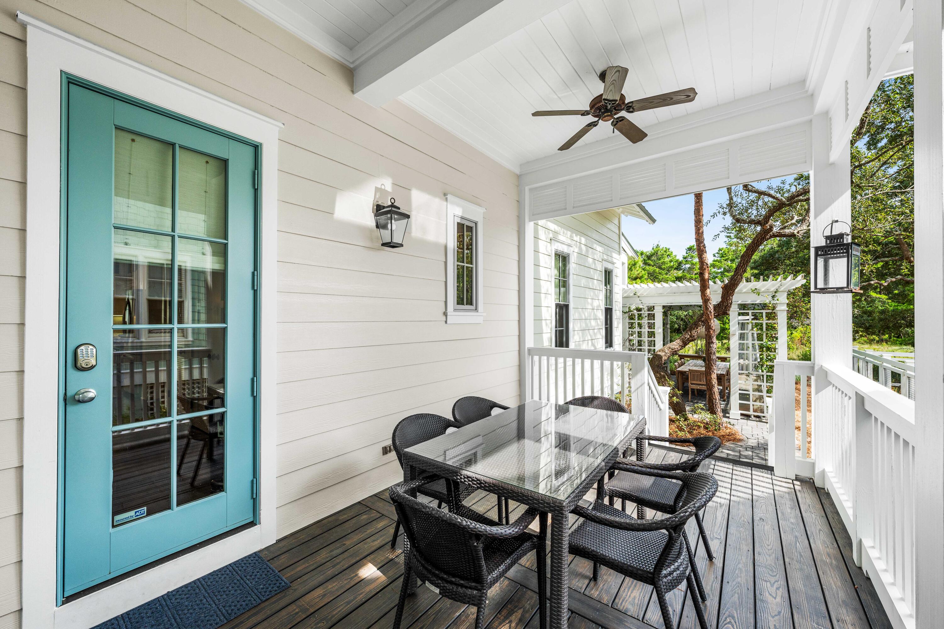 406 Red Cedar Way Santa Rosa Beach, FL 32459 - Photo 15 of 60 a view of a dining room with furniture window and outside view
