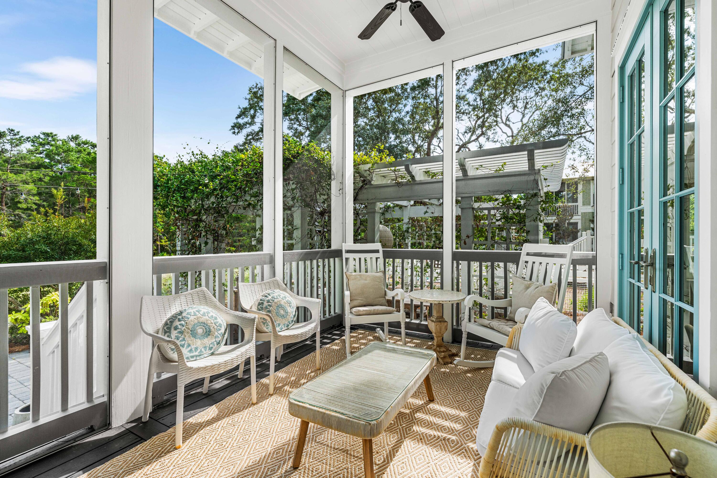 406 Red Cedar Way Santa Rosa Beach, FL 32459 - Photo 19 of 60 a balcony with furniture and a potted plant
