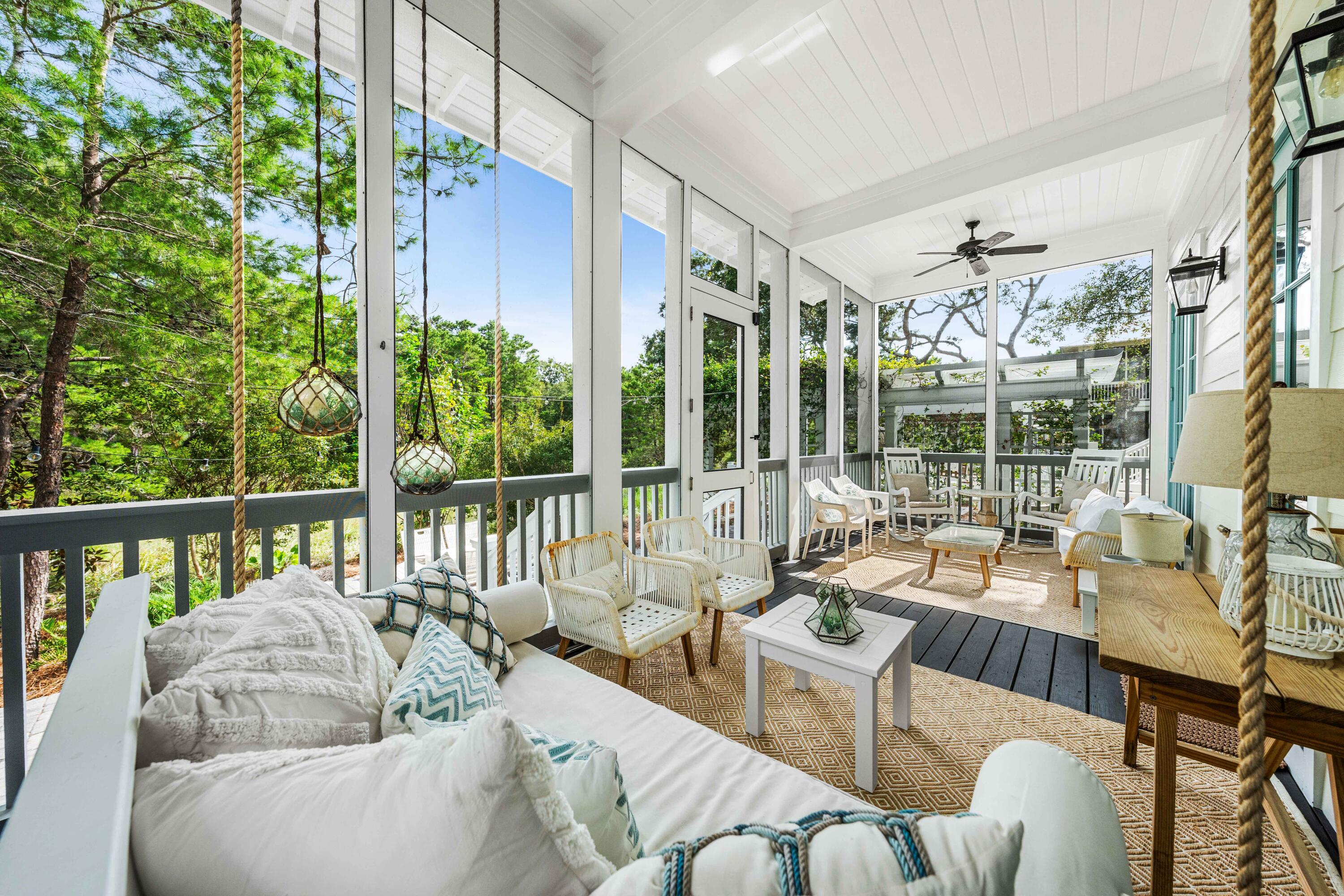 406 Red Cedar Way Santa Rosa Beach, FL 32459 - Photo 20 of 60 a living room with furniture and a large window