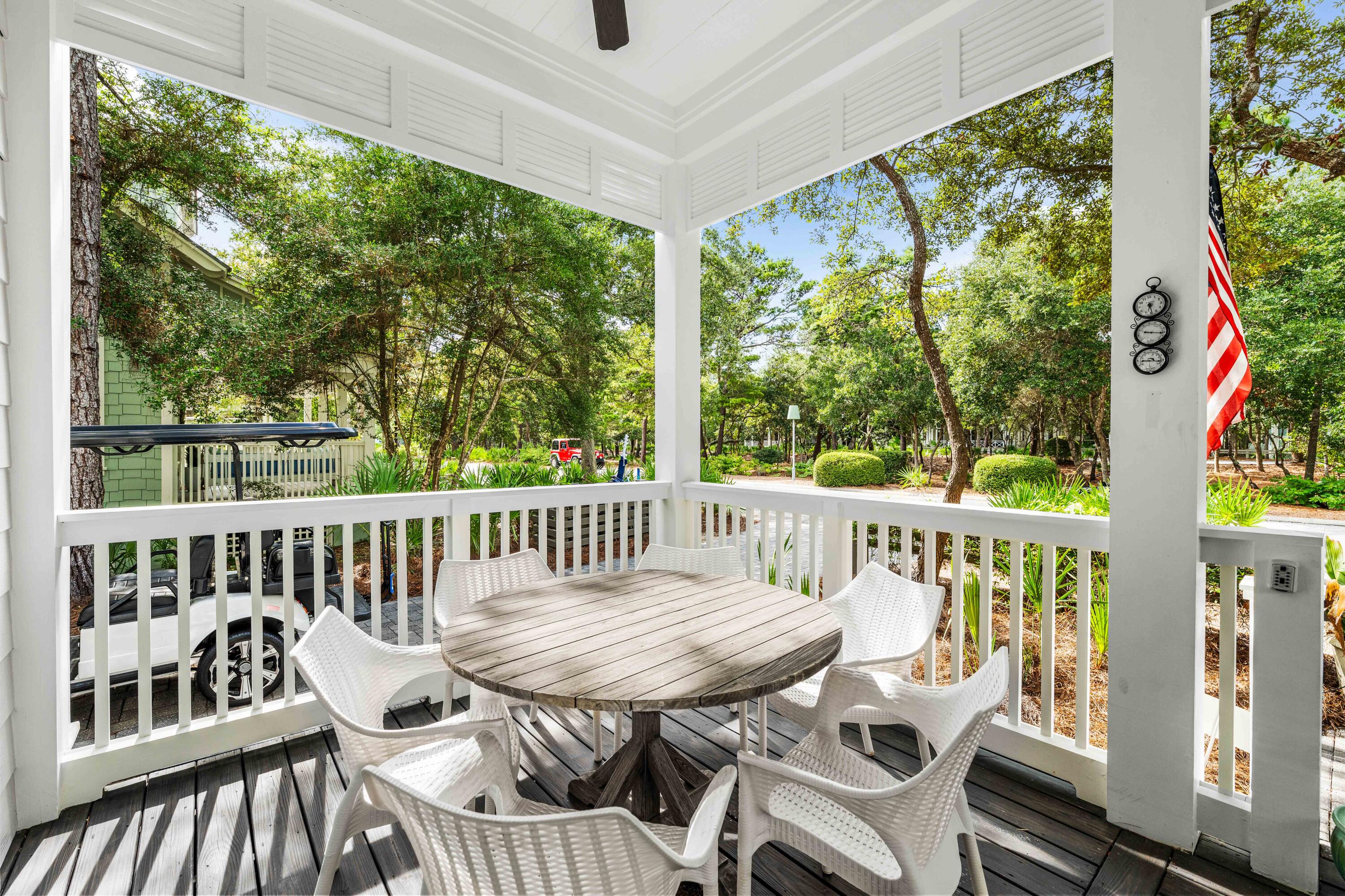 406 Red Cedar Way Santa Rosa Beach, FL 32459 - Photo 22 of 60 a view of a chair and table in the balcony
