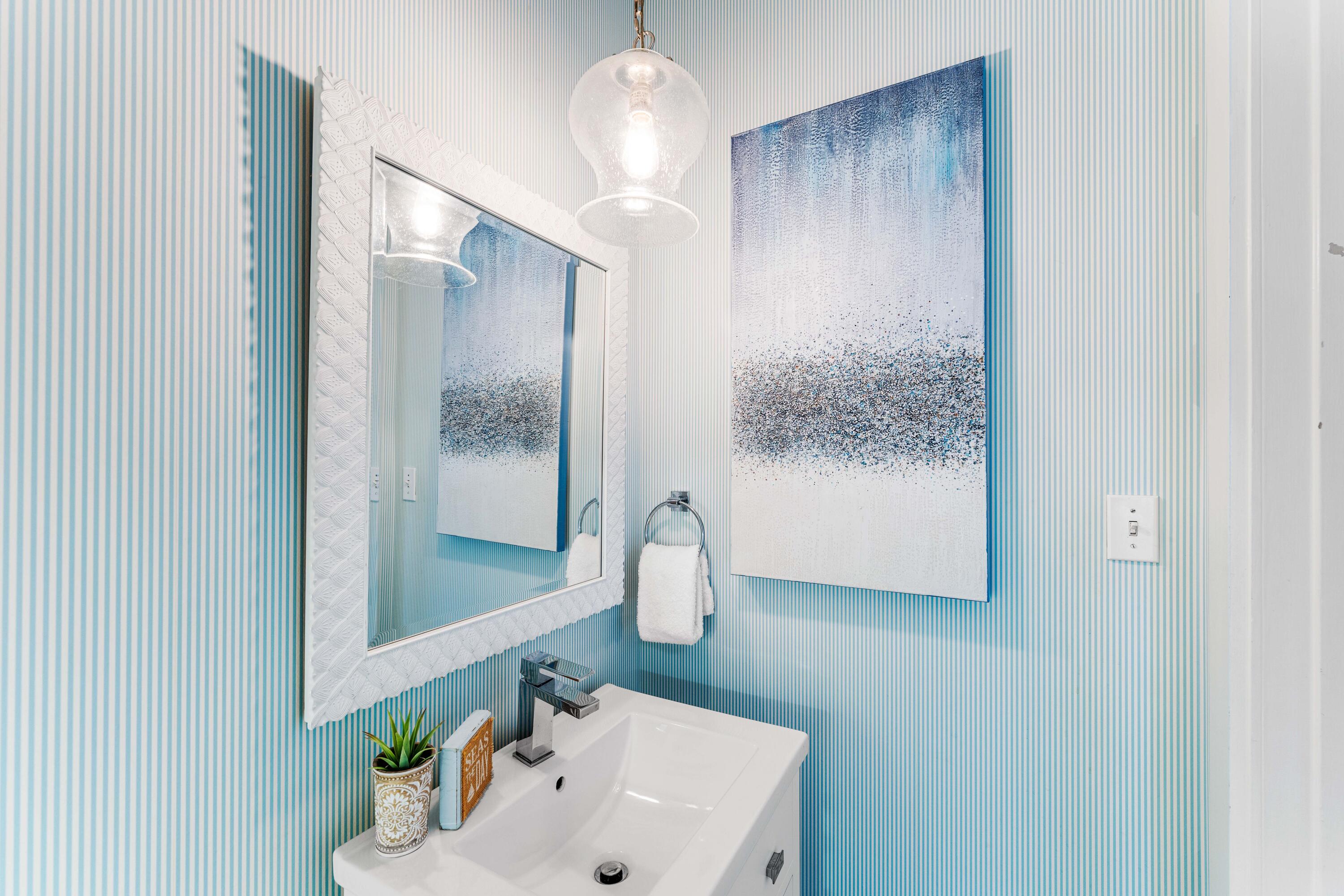 406 Red Cedar Way Santa Rosa Beach, FL 32459 - Photo 40 of 60 a bathroom with a sink and a mirror