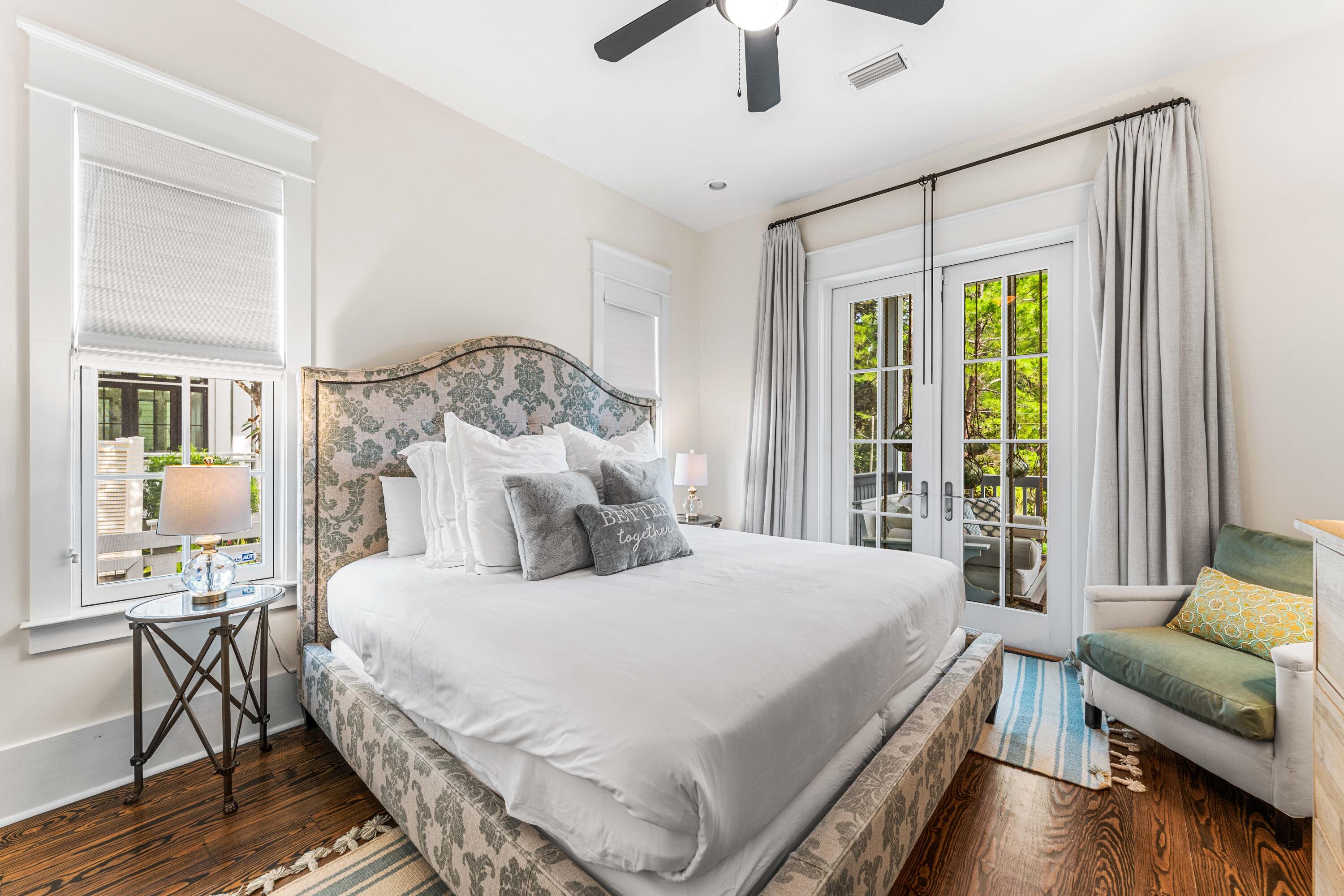 406 Red Cedar Way Santa Rosa Beach, FL 32459 - Photo 43 of 60 a bedroom with a bed a couch and a window