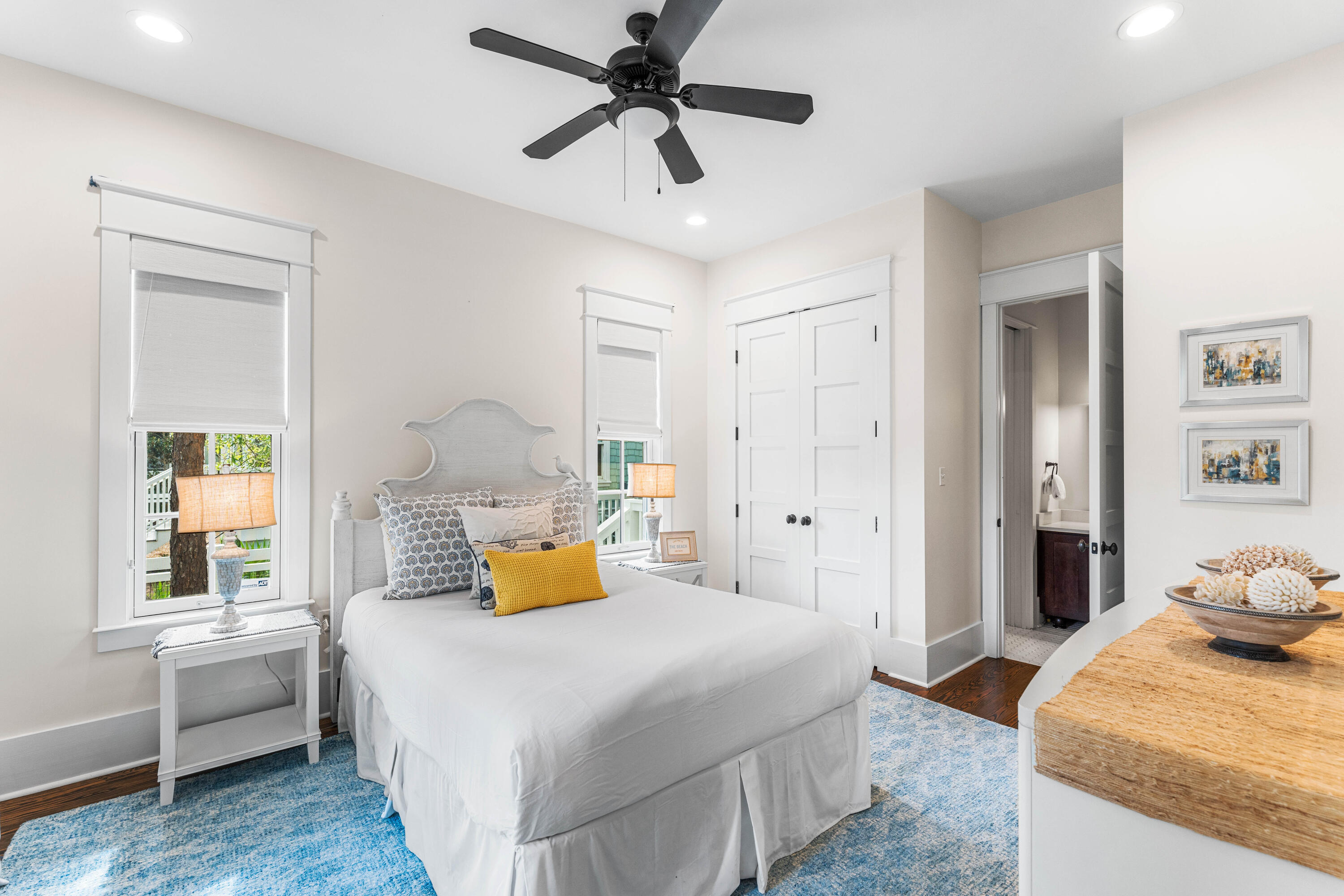 406 Red Cedar Way Santa Rosa Beach, FL 32459 - Photo 46 of 60 a bedroom with a bed and wooden floor