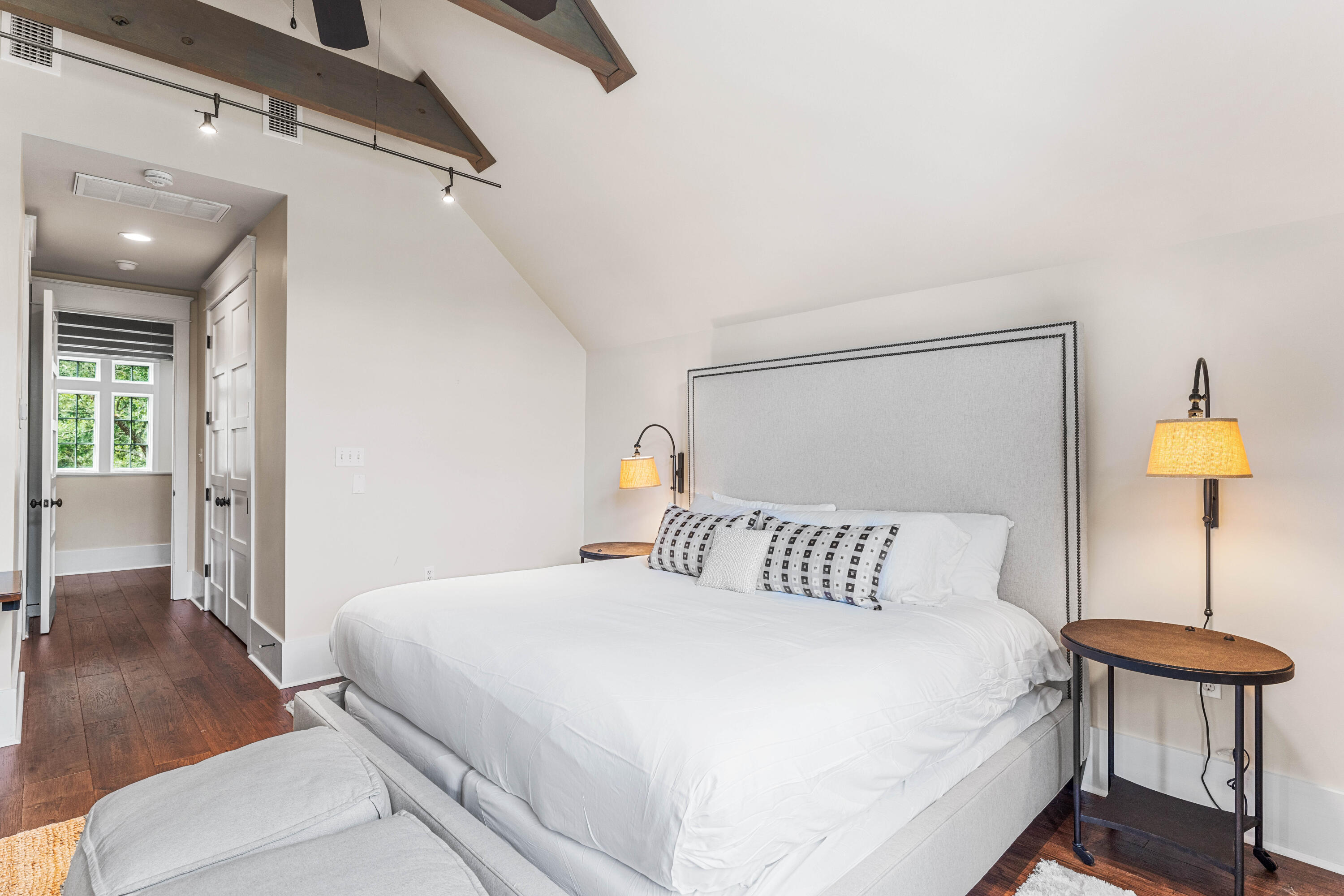 406 Red Cedar Way Santa Rosa Beach, FL 32459 - Photo 57 of 60 a bedroom with a bed and a lamp