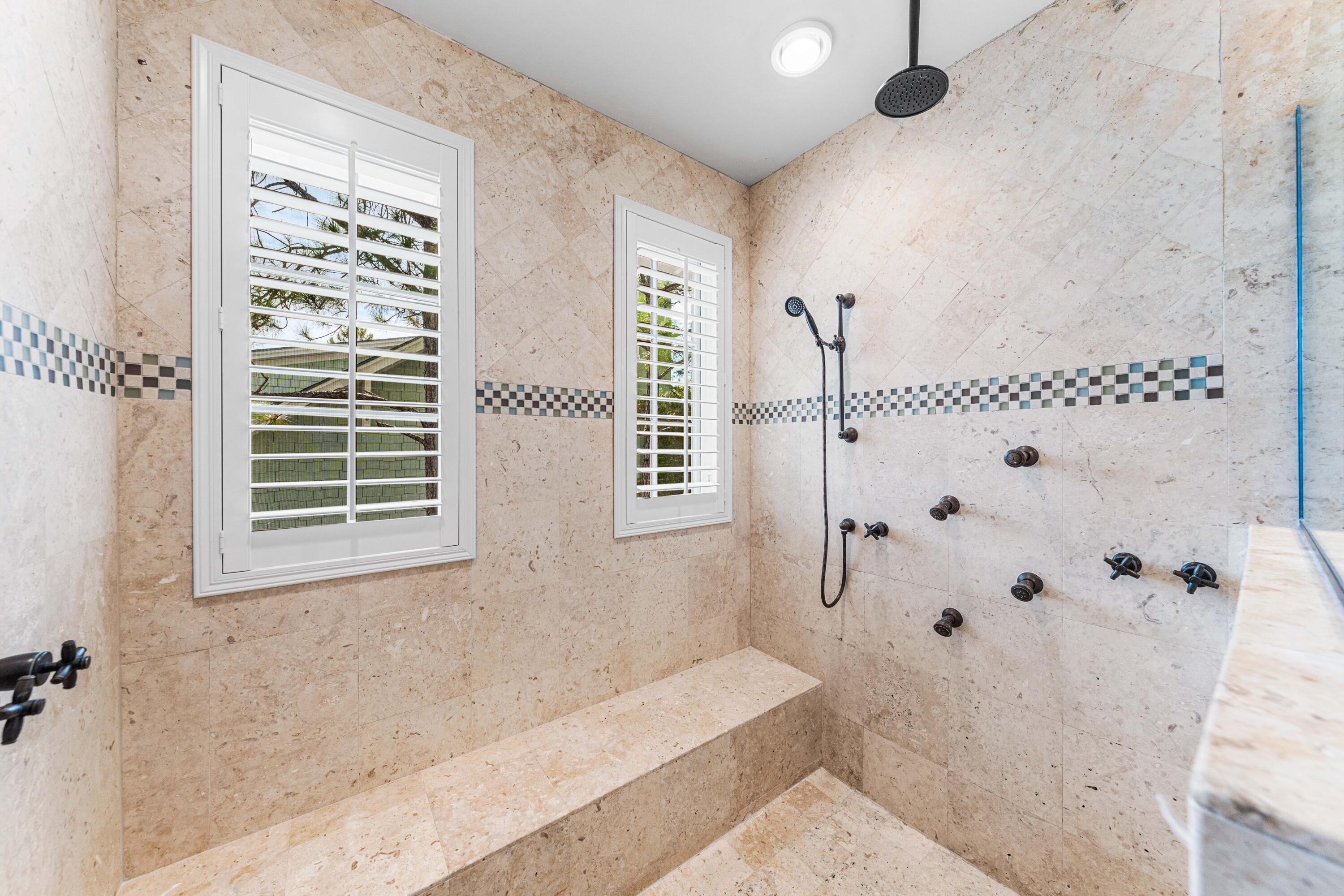 406 Red Cedar Way Santa Rosa Beach, FL 32459 - Photo 59 of 60 a bathroom with a bathtub and shower