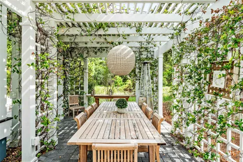 a view of a balcony with chairs