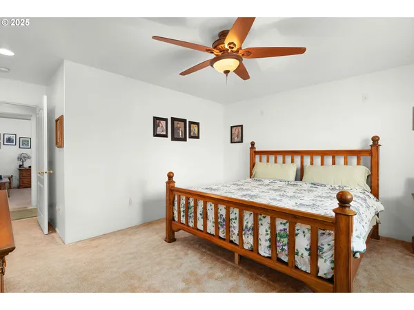 a bedroom with furniture and a window