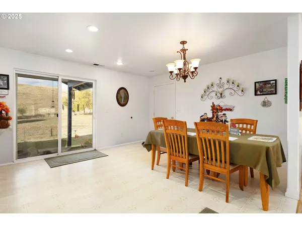 a view of a dining room with furniture