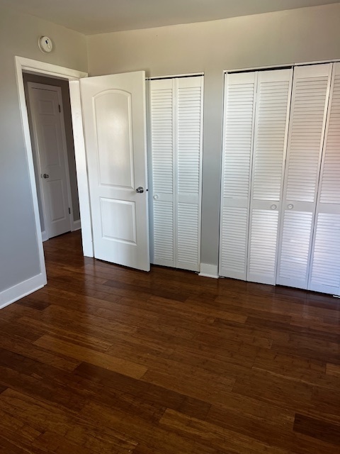 146 East Mill Street Wauconda, IL 60084 - Photo 11 of 17 an empty room with wooden floor and entrance