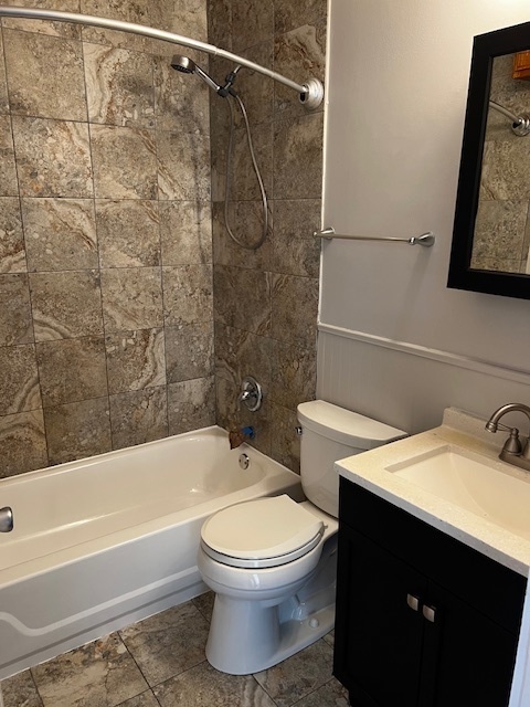 146 East Mill Street Wauconda, IL 60084 - Photo 13 of 17 a bathroom with a sink toilet and shower