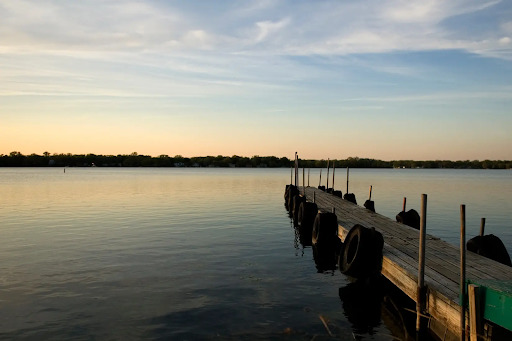 146 East Mill Street Wauconda, IL 60084 - Photo 17 of 17 a view of a lake with houses in the back