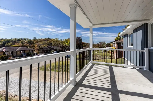 a view of city from a balcony