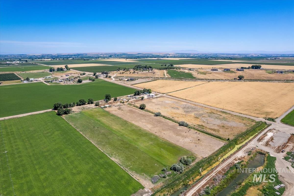 23743 Stephen Lane Parma, ID 83660 - Photo 5 of 34 Aerial overview of property's location with rural landscape and extensive farmland