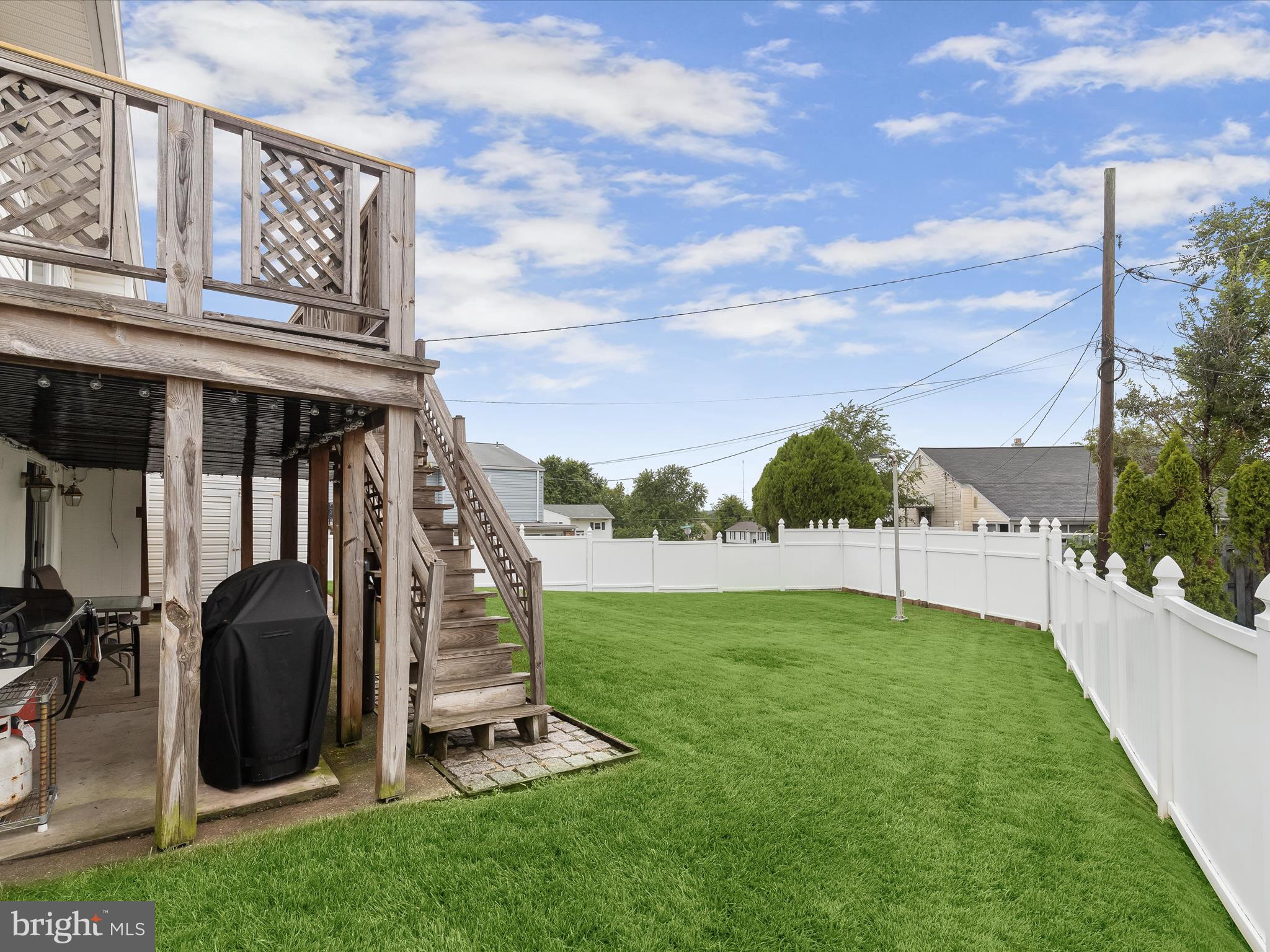 2302 Holyoke Road Rosedale, MD 21237 - Photo 40 of 52 Deck and Fenced Lawn