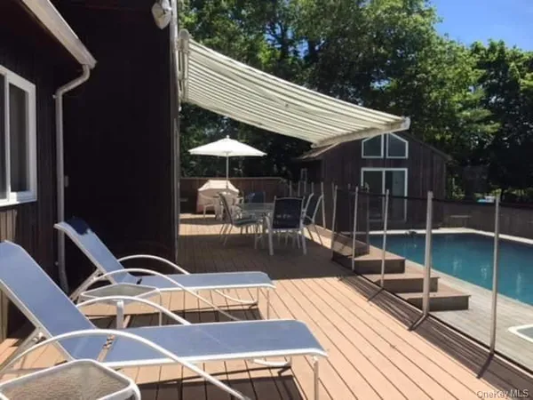 a view of outdoor space yard deck patio and swimming pool