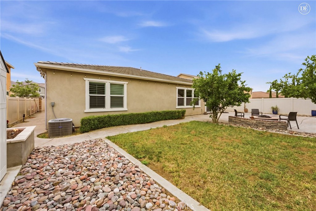 20948 Center Street Riverside, CA 92507 - Photo 77 of 92 a view of a house with backyard and sitting area