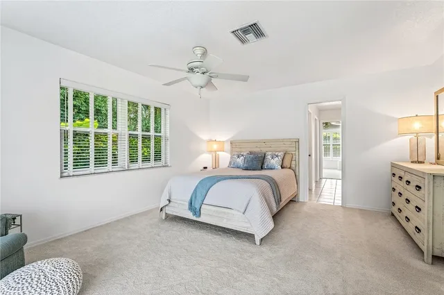 a bedroom with a bed and furniture