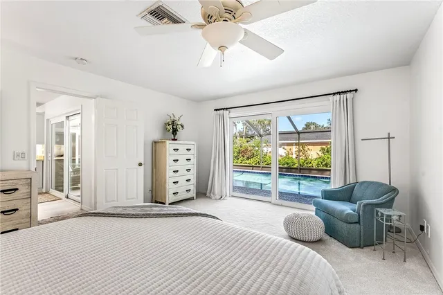 a bedroom with furniture and a window