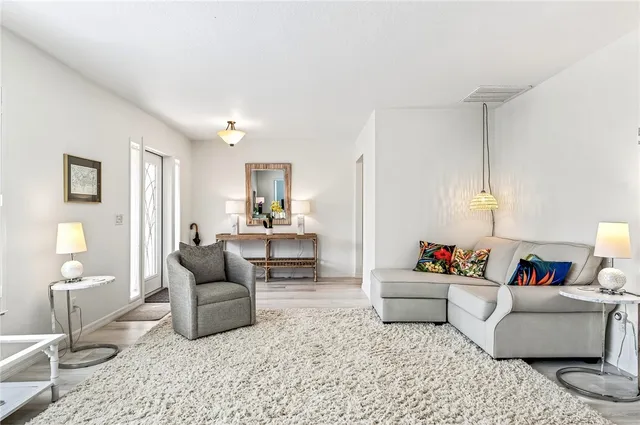 a living room with furniture and a couch
