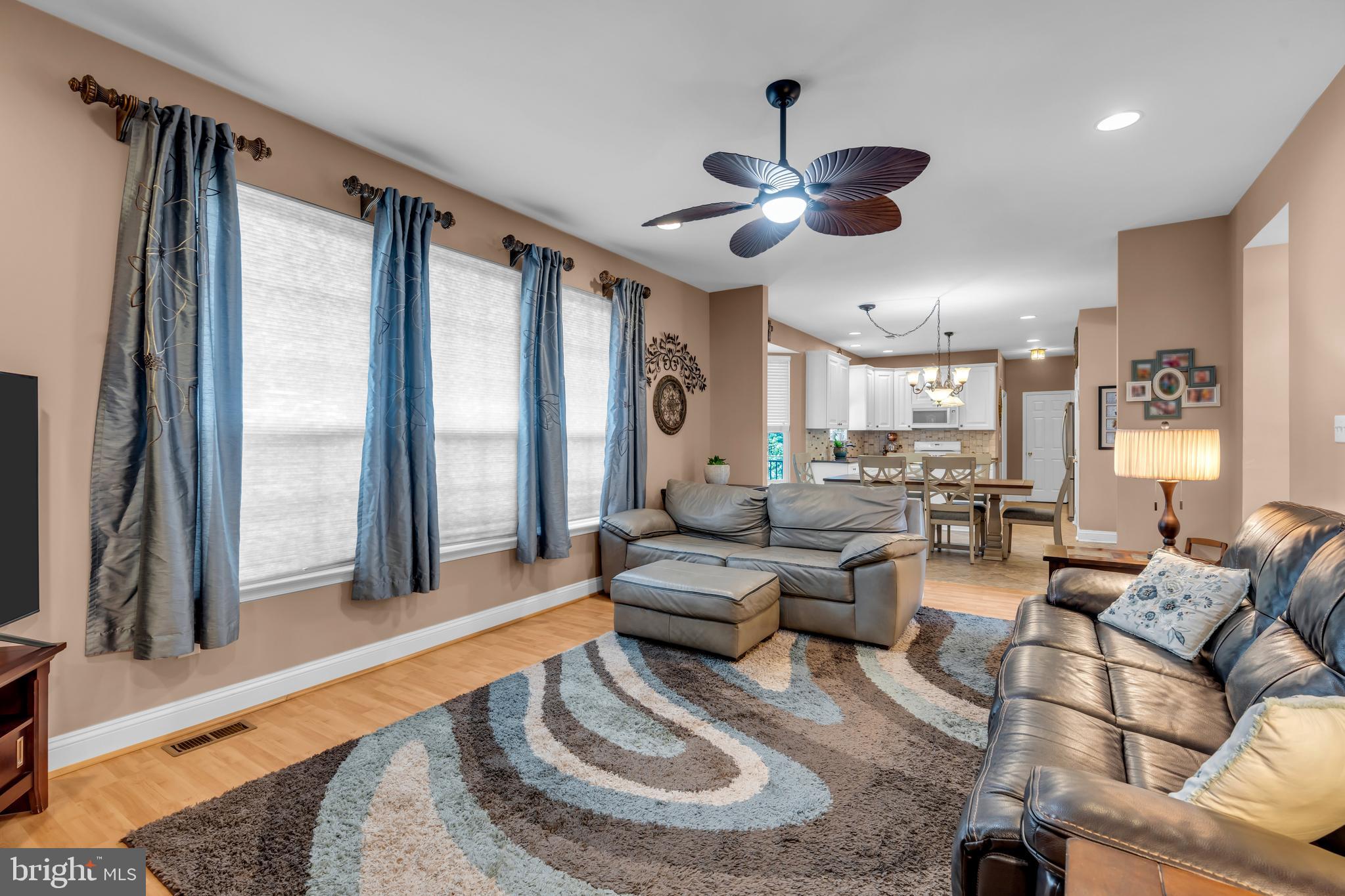 3 Pheasant Court, Unit 2710 Columbus, NJ 08022 - Photo 17 of 39 a living room with furniture and a large window
