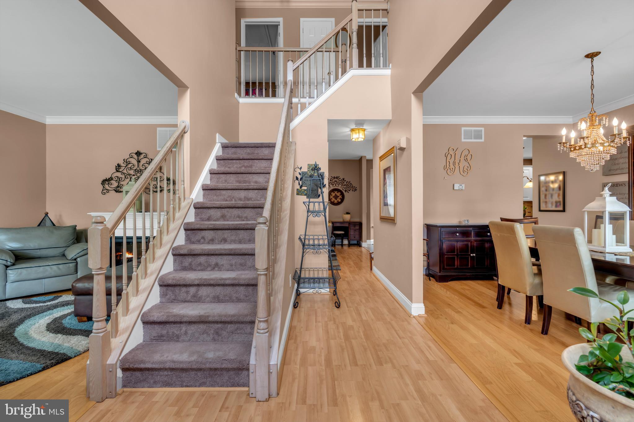 3 Pheasant Court, Unit 2710 Columbus, NJ 08022 - Photo 20 of 39 a view of entryway and hall with wooden floor